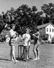Teenage girls with croquet mallets Poster Print - Item # VARSAL255422127