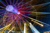 Colourful lights of a moving ferris wheel at nighttime; Calgary, Alberta, Canada PosterPrint - Item # VARDPI12285196