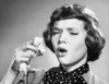 Close-up of a young woman holding a handkerchief and sneezing Poster Print - Item # VARSAL25534848A