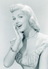 Studio portrait of young woman smiling Poster Print - Item # VARSAL255417255A