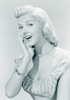 Studio portrait of young woman smiling Poster Print - Item # VARSAL255417255A