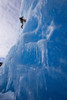 An Ice Climber Ascends The Face Of A Large Iceberg Frozen Into Mendenhall Lake, Juneau, Southeast Alaska, Winter Poster Print by John Hyde / Design Pics - Item # VARDPI2102839