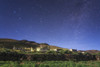 Northern stars above a moonlit Tibetan village in Tibet, China. Poster Print by Jeff Dai/Stocktrek Images - Item # VARPSTJFD200046S