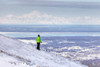 Woman snowshoer taking in the view of Mt. McKinley from Blueberry Hill at the Glen Alps area of Chugach State Park, Anchorage, Southcentral Alaska, Winter, HDR Poster Print by Lucas Payne / Design Pics - Item # VARDPI2327702