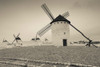 Antique windmills in a field, Campo De Criptana, Ciudad Real Province, Castilla La Mancha, Spain Poster Print by Panoramic Images - Item # VARPPI156910