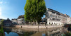 Reflection of buildings on water from Rue des Moulins, Petite France, Strasbourg, Bas-Rhin, Alsace, France Poster Print by Panoramic Images - Item # VARPPI164047