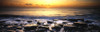 View of sea at sunset, South Wales, England Poster Print by Panoramic Images - Item # VARPPI161447