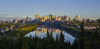 Skyline of downtown Edmonton reflected in the North Saskatchewan River under a blue sky; Edmonton, Alberta, Canada Poster Print by Ian Grant / Design Pics - Item # VARDPI12324249