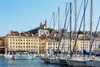 Marseille, Provence-Alpes-Cote d'Azur, France. View across Vieux-Port, the Old Port, to the 19th century Neo-Byzantine Basilica of Notre-Dame de la Garde. Poster Print by Panoramic Images - Item # VARPPI170247