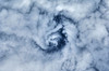Satellite view of cloud spiral above Earth over Canada Poster Print by Panoramic Images - Item # VARPPI181133