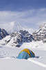 Mountain tent on ridge in winter, Mt. McKinley in background, part of Mt. Dan Beard immediately behind tent, Denali National Park and Preserve; Alaska, United States of America Poster Print by Gary Schultz / Design Pics - Item # VARDPI2356180