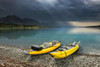 A pair of yellow inflatable kayaks on the Lower Twin Lake beach with a summer thunderstorm in the background, Lake Clark National Park & Preserve, Southcentral Alaska. Poster Print by Carl Johnson / Design Pics - Item # VARDPI12291224