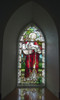 A Stained Glass Window Depicting Jesus Holding A Sheep At Church On The Beach; Ardnamurchan, Argyl, Scotland Poster Print by John Short / Design Pics - Item # VARDPI1971289