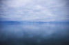 Beautiful moody sky reflected in the calm waters of Ballinskelligs Bay; County Kerry, Ireland Poster Print by Leah Bignell / Design Pics - Item # VARDPI12306518