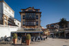 People at sidewalk cafe in town square, Comillas, Cantabria Province, Spain Poster Print by Panoramic Images - Item # VARPPI156722