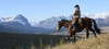 Cowboy riding with a view of the Rocky mountains, Ya-Ha-Tinda Ranch, Clearwater County; Alberta, Canada Poster Print by Deb Garside / Design Pics - Item # VARDPI12310975