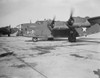 A new B-24E Liberator bomber returns to the airfield at Ford's Willow Run plant, Michigan. Poster Print by Stocktrek Images - Item # VARPSTSTK501059A