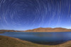 Polar star trails over Yamdrok Lake, Tibet, China. Poster Print by Jeff Dai/Stocktrek Images - Item # VARPSTJFD200052S