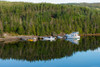 Boats reflected in calm lake Poster Print by Panoramic Images - Item # VARPPI175387