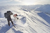 Skiers Prepare To Ski Down Peak 4940 In High Wind And Blowing Snow, Turnagain Pass, Kenai Mountains, Winter In Southcentral Alaska Poster Print by Joe Stock / Design Pics - Item # VARDPI2097979