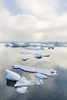 A foggy sunset over the Arctic Ocean illuminates icebergs on a calm evening; Barrow, North Slope, Alaska, United States of America Poster Print by Kevin G. Smith / Design Pics - Item # VARDPI12307923