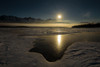 A full moon rises over the Chugach Mountains and the Knik River in South-central Alaska; Alaska, United States of America Poster Print by Ray Bulson / Design Pics - Item # VARDPI12321341