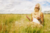 Portrait Of Woman Praying In Field Poster Print by Don Hammond / Design Pics - Item # VARDPI1778183