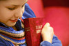 Teen Holds Bible And Prays Poster Print by Don Hammond / Design Pics - Item # VARDPI1779873