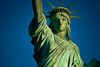 Statue of Liberty against blue sky, New York City, New York State, USA Poster Print by Panoramic Images - Item # VARPPI173629