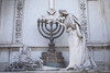 Buenos Aires, Argentina; A Stone Statue Of An Angel Lighting A Candelabra In Recoleta Cemetery Poster Print by Stuart Westmorland / Design Pics - Item # VARDPI1875950