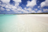 White sand beach with crystal clear turquoise water and blue sky Poster Print by Chris Caldicott / Design Pics - Item # VARDPI12308330