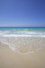 White sand island beach with crystal clear turquoise water and blue sky Poster Print by Chris Caldicott / Design Pics - Item # VARDPI12308446