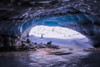 A man is framed by the entrance to a large ice cave near the terminus of Augustana Glacier in the Alaska Range in winter; Alaska, United States of America Poster Print by Steven Miley / Design Pics - Item # VARDPI12324553