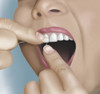 Flossing between front teeth. Poster Print by TriFocal Communications/Stocktrek Images - Item # VARPSTTRF700085H