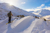 A backcountry skier looks over the Black Rapids Glacier valley from a high point on the terminal moraine in winter; Alaska, United States of America Poster Print by Steven Miley / Design Pics - Item # VARDPI12324559