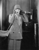 Telephone Booth, 1920S. /Ncolleen Moore In A 1920S Silent Movie Still. Poster Print by Granger Collection - Item # VARGRC0065897