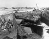 World War Ii: D-Day, 1944. /Ninvasion Crafts Piled Up On Wrecked 'Whale' Causeways At Mulberry Harbor, Normandy, After The Storm That Followed D-Day, 6 June 1944. Poster Print by Granger Collection - Item # VARGRC0079927