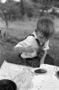 Migrant Boy, 1939. /Nson Of A Migrant Family Eating A Lunch Of Blackberry Pie Along The Highway East Of Fort Gibson, Oklahoma. Photograph By Russell Lee, June 1939. Poster Print by Granger Collection - Item # VARGRC0108373