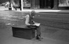 Business Man, 1940. /Na Businessman Sitting On A Garbage Crate Reading While Waiting For A Street Car In Chicago, Illinois. Photograph By John Vachon In July 1940. Poster Print by Granger Collection - Item # VARGRC0119388