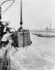Harry Houdini (1874-1926). /Namerican Magician. A Crate Containing Houdini Being Lowered Into New York Harbor. Photograph By Carl Dietz, C1914. Poster Print by Granger Collection - Item # VARGRC0351385