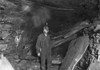 Hine: Coal Miner, 1908. /Na Miner In Front Of A Great Fall Of Slate That Blocked The Entry To Turkey Knob Mine, Macdonald, West Virginia. Photograph By Lewis Hine, October 1908. Poster Print by Granger Collection - Item # VARGRC0107786