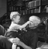 Carl Sandburg (1878-1967). /Namerican Writer. With His Grandson At The Chikaming Goat Farm In Herbert, Michigan. Photograph By John R. Whiting, C1945. Poster Print by Granger Collection - Item # VARGRC0175717