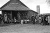 Cotton Pickers, 1935. /Nafrican American Migrant Workers Waiting For Transportation From The Cotton Fields, Pulaski County, Arkansas. Photograph By Ben Shahn In October 1935. Poster Print by Granger Collection - Item # VARGRC0118994