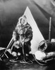 Eskimo Woman. /Neskimo Woman Wearing Traditional Clothing, Holding A Rifle And Standing In Front Of A Tent Next To A Packed Sled. Photograph, Late 19Th Or Early 20Th Century. Poster Print by Granger Collection - Item # VARGRC0121136