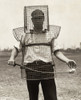 Golf Caddy, C1920. /Ngolf Caddy Mozart Johnson Wearing Wire Mesh Protective Device. Photograph, C1920. Poster Print by Granger Collection - Item # VARGRC0265386