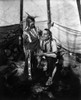 Blackfoot Man & Boy, C1914. /Na Blackfoot Man And Boy Photographed Inside A Tepee With A Peace Pipe, C1914. Poster Print by Granger Collection - Item # VARGRC0108062