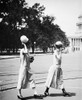 Women'S Fashion, C1920. /Ntwo Young Campaigners For Equal Rights Tipping Their Hats In Washington, D.C. Poster Print by Granger Collection - Item # VARGRC0017275