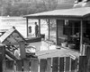 Washington, D.C.: Flood. /Na Man On His Porch On A Flooded Street In Washington, D.C., 1924. Poster Print by Granger Collection - Item # VARGRC0130074