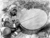 Alaska: Eskimo, C1929. /Nan Eskimo Drummer Playing His Drum, An Instrument Made Of Walrus Stomach Or Bladder, Nunivak Island, Alaska. Photographed By Edward S. Curtis, C1929. Poster Print by Granger Collection - Item # VARGRC0121564