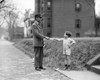 Christmas, 1920. /Na Boy Handing A Mail Carrier A Letter For Santa Claus. Photograph, C1920. Poster Print by Granger Collection - Item # VARGRC0409468